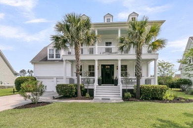 Welcome home to this stunning Southern retreat located in the on Dunes West Golf Club in South Carolina - for sale on GolfHomes.com, golf home, golf lot
