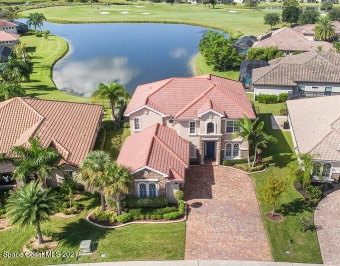 Graciously settled on 0.21 acres is this masterfully crafted on Fairway Lakes at Viera in Florida - for sale on GolfHomes.com, golf home, golf lot