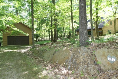 Check out this charming, cozy cabin w/ a fantastic corner lot on Hide-A-Way Hills Golf Club in Ohio - for sale on GolfHomes.com, golf home, golf lot