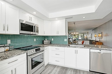 Renovated CORNER 2 bed/2 bath 1291 sq. ft residence located in on Wynmoor Golf Course in Florida - for sale on GolfHomes.com, golf home, golf lot