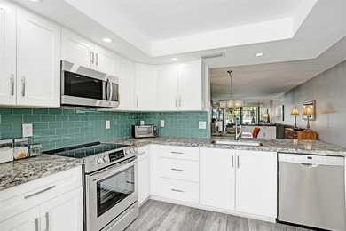 Renovated CORNER 2 bed/2 bath 1291 sq. ft residence located in on Wynmoor Golf Course in Florida - for sale on GolfHomes.com, golf home, golf lot