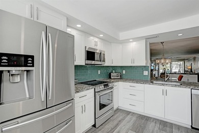 Renovated CORNER 2 bed/2 bath 1291 sq. ft residence located in on Wynmoor Golf Course in Florida - for sale on GolfHomes.com, golf home, golf lot