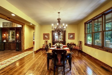 This stunning home sits on a private 2.45 ac. lot with lots of on Lake Toxaway Country Club in North Carolina - for sale on GolfHomes.com, golf home, golf lot