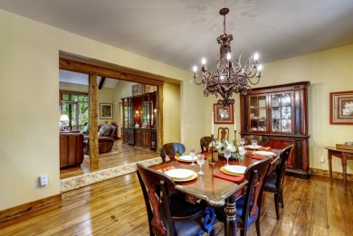 This stunning home sits on a private 2.45 ac. lot with lots of on Lake Toxaway Country Club in North Carolina - for sale on GolfHomes.com, golf home, golf lot