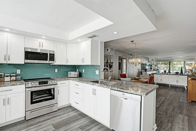 Renovated CORNER 2 bed/2 bath 1291 sq. ft residence located in on Wynmoor Golf Course in Florida - for sale on GolfHomes.com, golf home, golf lot