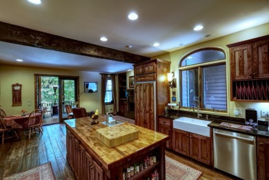 This stunning home sits on a private 2.45 ac. lot with lots of on Lake Toxaway Country Club in North Carolina - for sale on GolfHomes.com, golf home, golf lot