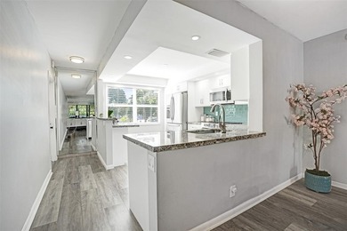 Renovated CORNER 2 bed/2 bath 1291 sq. ft residence located in on Wynmoor Golf Course in Florida - for sale on GolfHomes.com, golf home, golf lot