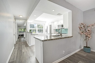 Renovated CORNER 2 bed/2 bath 1291 sq. ft residence located in on Wynmoor Golf Course in Florida - for sale on GolfHomes.com, golf home, golf lot