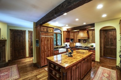 This stunning home sits on a private 2.45 ac. lot with lots of on Lake Toxaway Country Club in North Carolina - for sale on GolfHomes.com, golf home, golf lot