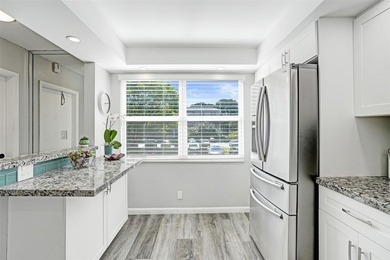 Renovated CORNER 2 bed/2 bath 1291 sq. ft residence located in on Wynmoor Golf Course in Florida - for sale on GolfHomes.com, golf home, golf lot