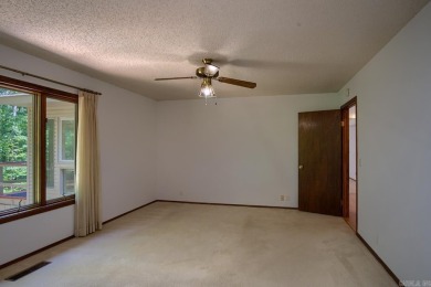 This bright, peaceful well-maintained home with its serene on DeSoto Golf Course in Arkansas - for sale on GolfHomes.com, golf home, golf lot