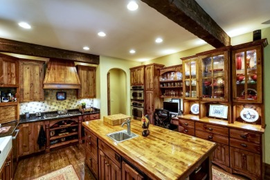 This stunning home sits on a private 2.45 ac. lot with lots of on Lake Toxaway Country Club in North Carolina - for sale on GolfHomes.com, golf home, golf lot