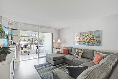 Renovated CORNER 2 bed/2 bath 1291 sq. ft residence located in on Wynmoor Golf Course in Florida - for sale on GolfHomes.com, golf home, golf lot