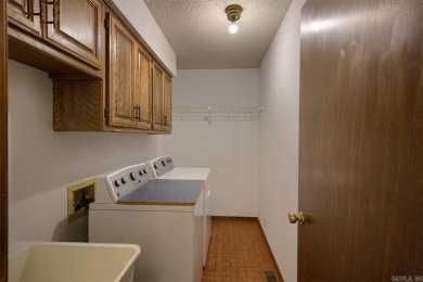 This bright, peaceful well-maintained home with its serene on DeSoto Golf Course in Arkansas - for sale on GolfHomes.com, golf home, golf lot