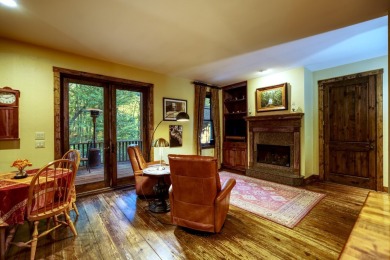 This stunning home sits on a private 2.45 ac. lot with lots of on Lake Toxaway Country Club in North Carolina - for sale on GolfHomes.com, golf home, golf lot