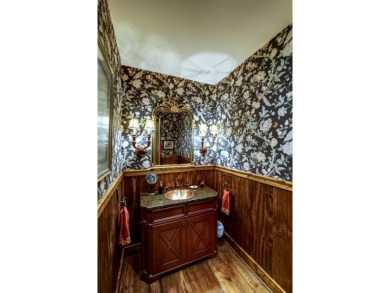 This stunning home sits on a private 2.45 ac. lot with lots of on Lake Toxaway Country Club in North Carolina - for sale on GolfHomes.com, golf home, golf lot