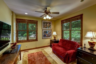 This stunning home sits on a private 2.45 ac. lot with lots of on Lake Toxaway Country Club in North Carolina - for sale on GolfHomes.com, golf home, golf lot