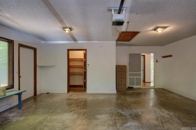 This bright, peaceful well-maintained home with its serene on DeSoto Golf Course in Arkansas - for sale on GolfHomes.com, golf home, golf lot