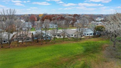 Remarkable curbside with the entire front of this home having on Angushire Golf Course in Minnesota - for sale on GolfHomes.com, golf home, golf lot