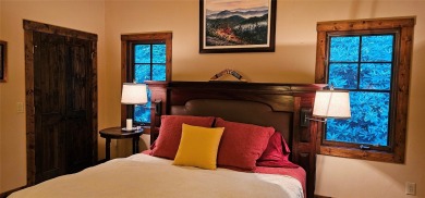 This stunning home sits on a private 2.45 ac. lot with lots of on Lake Toxaway Country Club in North Carolina - for sale on GolfHomes.com, golf home, golf lot