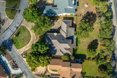 This impressive stone and stucco home, approximately 3,820 sq on Riverhill Country Club in Texas - for sale on GolfHomes.com, golf home, golf lot