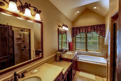 This stunning home sits on a private 2.45 ac. lot with lots of on Lake Toxaway Country Club in North Carolina - for sale on GolfHomes.com, golf home, golf lot