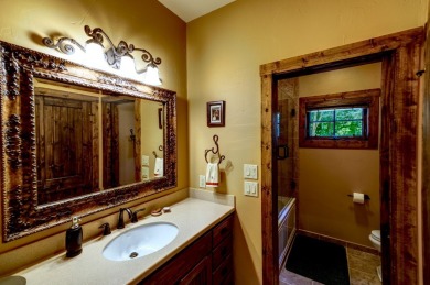 This stunning home sits on a private 2.45 ac. lot with lots of on Lake Toxaway Country Club in North Carolina - for sale on GolfHomes.com, golf home, golf lot