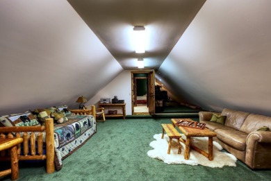 This stunning home sits on a private 2.45 ac. lot with lots of on Lake Toxaway Country Club in North Carolina - for sale on GolfHomes.com, golf home, golf lot