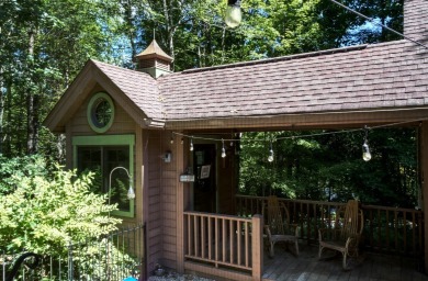 This stunning home sits on a private 2.45 ac. lot with lots of on Lake Toxaway Country Club in North Carolina - for sale on GolfHomes.com, golf home, golf lot
