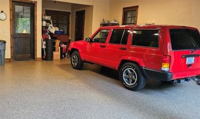 This stunning home sits on a private 2.45 ac. lot with lots of on Lake Toxaway Country Club in North Carolina - for sale on GolfHomes.com, golf home, golf lot