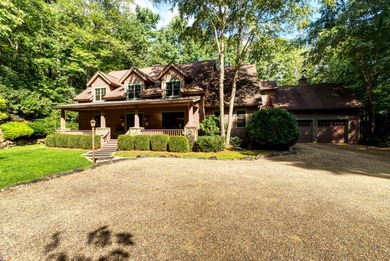 This stunning home sits on a private 2.45 ac. lot with lots of on Lake Toxaway Country Club in North Carolina - for sale on GolfHomes.com, golf home, golf lot