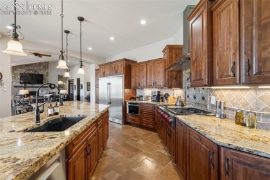 Experience luxurious Colorado living in this stunning on Kings Deer Golf Club in Colorado - for sale on GolfHomes.com, golf home, golf lot