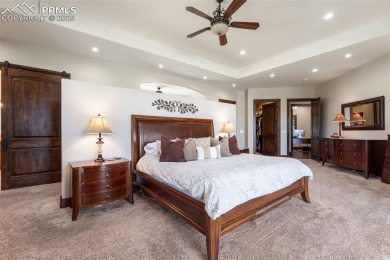 Experience luxurious Colorado living in this stunning on Kings Deer Golf Club in Colorado - for sale on GolfHomes.com, golf home, golf lot