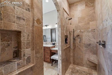 Experience luxurious Colorado living in this stunning on Kings Deer Golf Club in Colorado - for sale on GolfHomes.com, golf home, golf lot