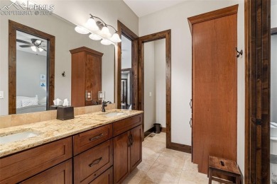 Experience luxurious Colorado living in this stunning on Kings Deer Golf Club in Colorado - for sale on GolfHomes.com, golf home, golf lot