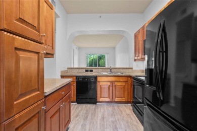 Step into style with this charming 2-bedroom, 2-bathroom unit on Palm-Aire Country Club and Resort - The Oaks in Florida - for sale on GolfHomes.com, golf home, golf lot
