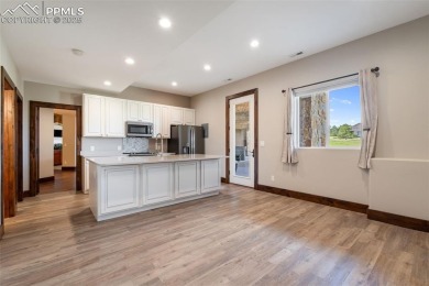 Experience luxurious Colorado living in this stunning on Kings Deer Golf Club in Colorado - for sale on GolfHomes.com, golf home, golf lot