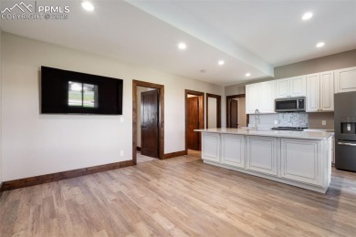 Experience luxurious Colorado living in this stunning on Kings Deer Golf Club in Colorado - for sale on GolfHomes.com, golf home, golf lot