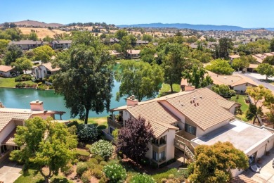 Enjoy peaceful lakeside living in this beautifully updated condo on Villages Golf and Country Club in California - for sale on GolfHomes.com, golf home, golf lot