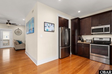 This turnkey 5-bedroom, 3.5-bath home in Ocean Lakes Section O on The Currituck Golf Club in North Carolina - for sale on GolfHomes.com, golf home, golf lot