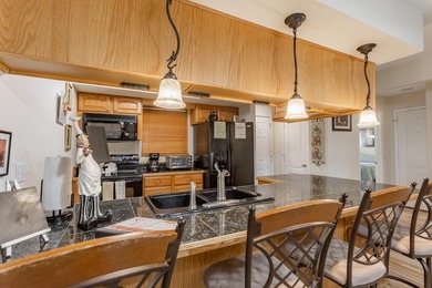 Relax and enjoy the view and great back yard from your large on Pointe Royale Village Country Club in Missouri - for sale on GolfHomes.com, golf home, golf lot