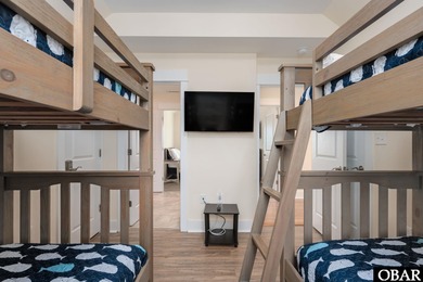 This turnkey 5-bedroom, 3.5-bath home in Ocean Lakes Section O on The Currituck Golf Club in North Carolina - for sale on GolfHomes.com, golf home, golf lot