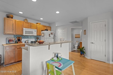 Top-Floor Golf Course View Condo in Resort-Style Community Wake on Members Club At St. James Plantation in North Carolina - for sale on GolfHomes.com, golf home, golf lot