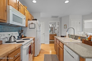 Top-Floor Golf Course View Condo in Resort-Style Community Wake on Members Club At St. James Plantation in North Carolina - for sale on GolfHomes.com, golf home, golf lot