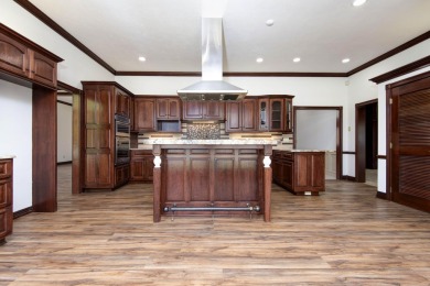 Magnificent  Home in Millwood Golf Course Community overlooking on Millwood Golf and Racquet Club in Missouri - for sale on GolfHomes.com, golf home, golf lot