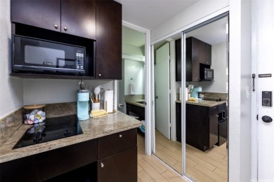 Situated in the center of Waikiki, Island Colony is a on Ala Wai Golf Course in Hawaii - for sale on GolfHomes.com, golf home, golf lot