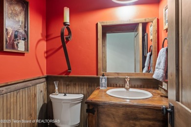 Luxury Golf  Tennis cabin overlooking open space with Cottonwood on Jackson Hole Golf and Tennis Club in Wyoming - for sale on GolfHomes.com, golf home, golf lot