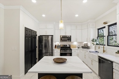 Welcome to this stunning, fully renovated three-story home on Hamilton Mill Golf Club in Georgia - for sale on GolfHomes.com, golf home, golf lot