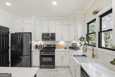 Welcome to this stunning, fully renovated three-story home on Hamilton Mill Golf Club in Georgia - for sale on GolfHomes.com, golf home, golf lot