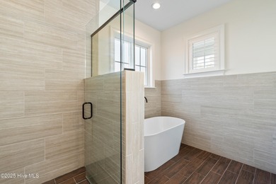 Elegant upgrades and thoughtful design define this like-new on Sea Trail Golf Resort in North Carolina - for sale on GolfHomes.com, golf home, golf lot